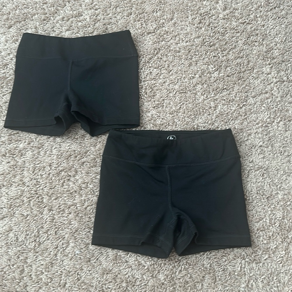 two pair black shorts